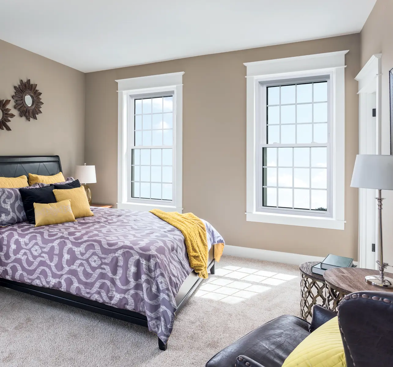 OKNA 500 Series double-hung windows installed in a bedroom
